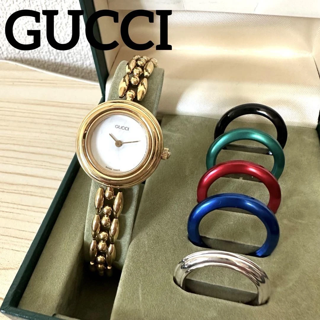Complet avec accessoires montre GUCCI 11/12.2 lunette de changement, piles neuves