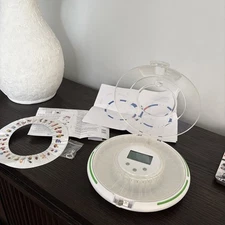 New- Automatic Pill Dispenser 28 day Medication Organizer with Alarms Lights Key