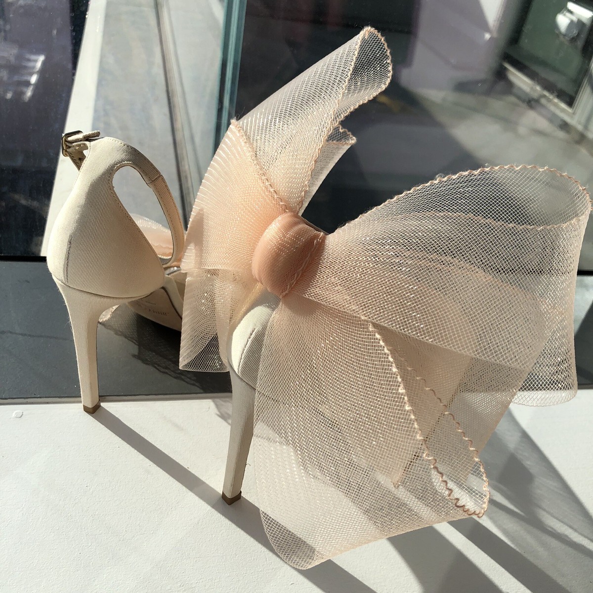 JIMMY CHOO Aveline 100 Asymmetric Grosgrain Mesh Bow Nude