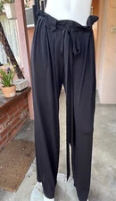 Thomas Wylde black "jersey like" wide leg, paperbag waist.