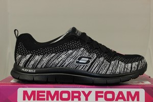 black and silver skechers