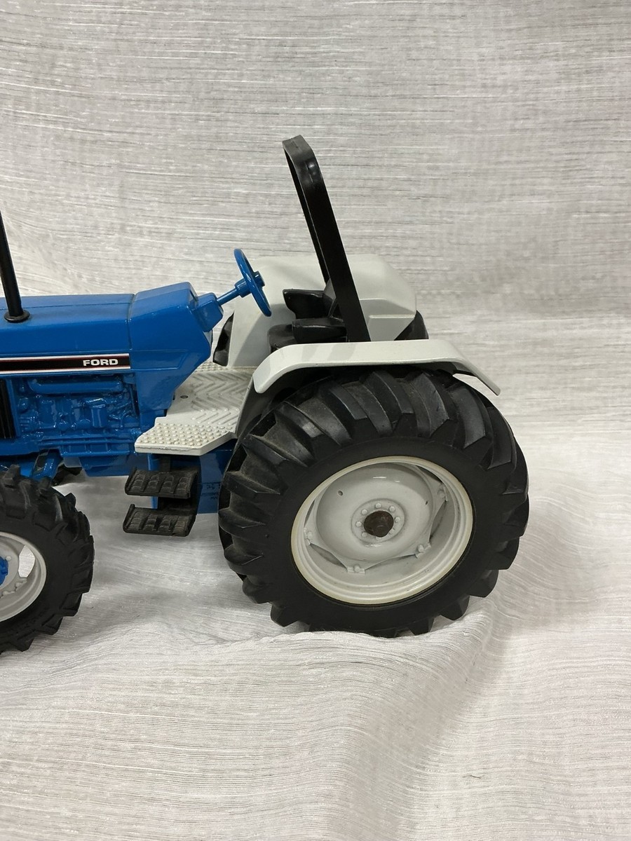 Ertl Ford 7740 1/16 Diecast Farm Tractor Toy w/Roll Over Bar 4