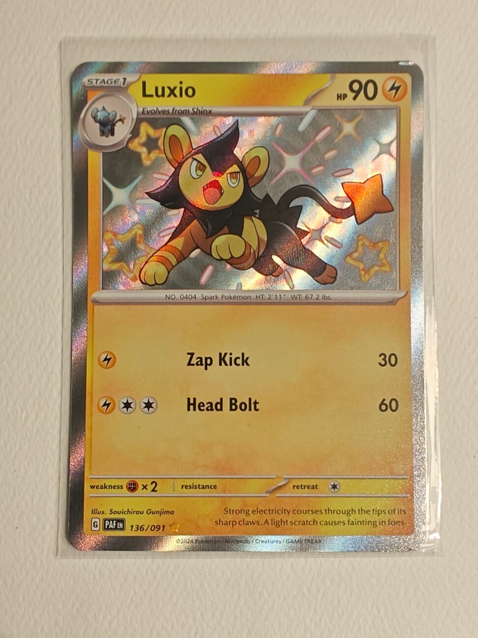 Pokémon TCG Luxio Scarlet & Violet: Paldean Fates 136/091 Holo Shiny Rare