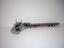 DCP FIRST GEAR 1/64 BLACK W/T STRIPES PETE 389 DAYCAB LANDOLL 440 TRAVELING AXLE