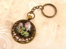 Elegant Keyring with Jeweled Rose and Star Ornaments Pink Bronze Tone