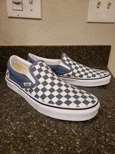 baby blue slip on vans with checkered stripe