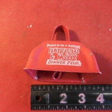 Hatfield & McCoy Dinner Feud Cow Bell Red Hatfield Pigeon Forge Souvenir 3"