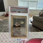 Pokemon 2000 Team Rocket Eevee Regular 1st Edition 55/82 PSA 9 English