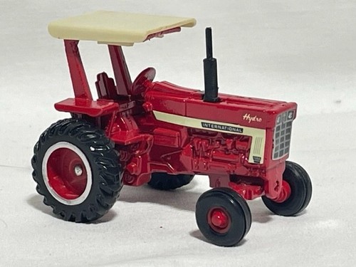 ERTL 1/64 International 1066 Hydro w/ ROPS, white stripe, Red Farm Toy Tractor - Picture 2 of 2