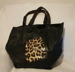black handbag with leopard print