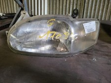 Feu avant (phare) Ford ESCORT