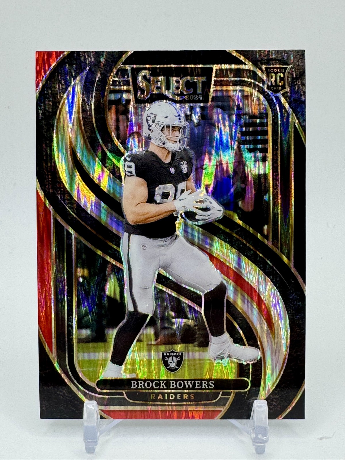 2024 Panini Select #118 Brock Bowers Black & Red Prizm Shock