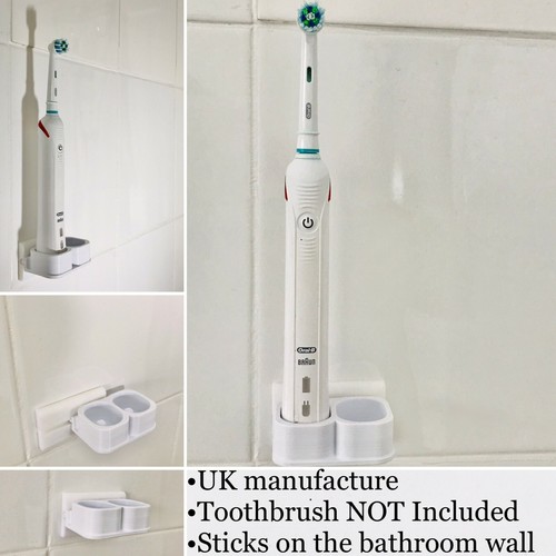 Cepillo de dientes con soporte montado en pared dos 2 cepillos de dientes eléctricos orales B hechos en el Reino Unido - Imagen 1 de 10