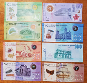 NICARAGUA LOT OF 8 NOTES UNCIRCULATED DATES AND DENOMINATIONS VARY