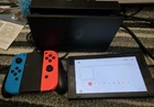 Nintendo Switch Console With pad power cable and docking station great condition