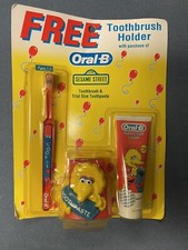 1996 Oral-B Sesame Street Toothbrush Trial Size Toothpaste  Toothbrush Holder