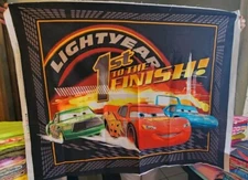 1 yard Disney quilting fabric 1st to the FINISH Cars CP 25267