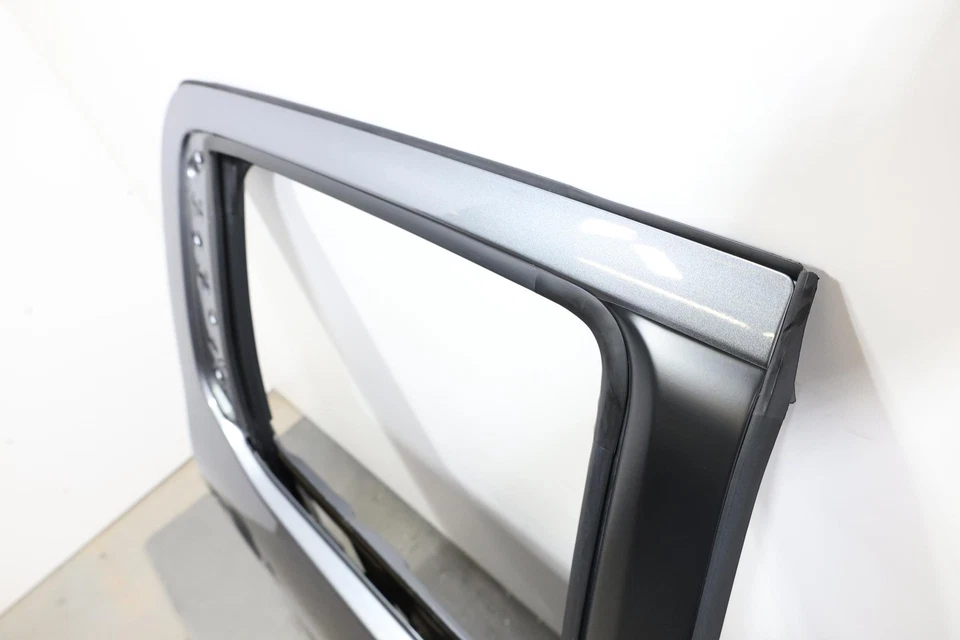 Carcasa puerta trasera derecha pasajero Nissan Frontier 2022-2026 OEM GRIS_KAD Foto 4 de 4