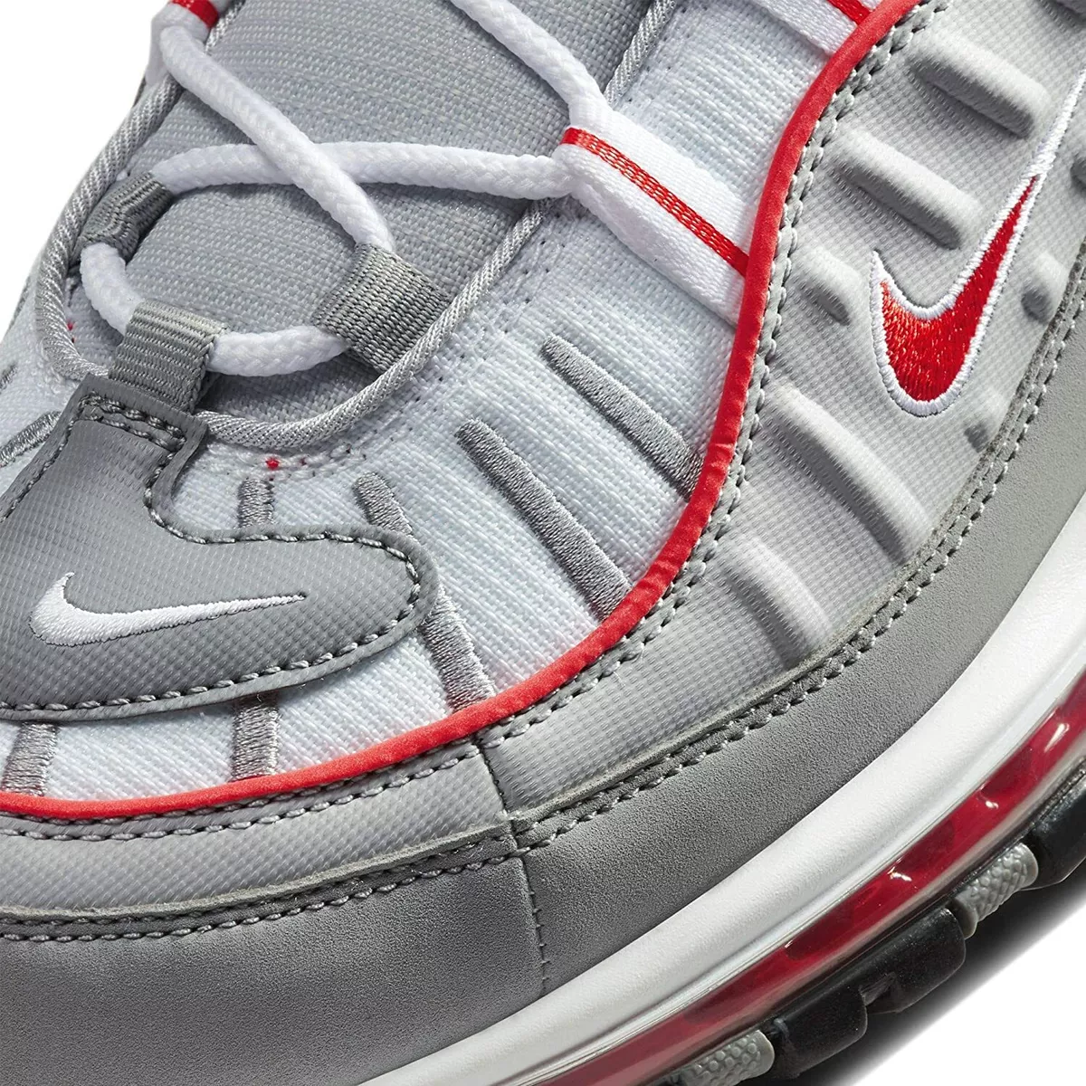 Grey and red nike best sale trainers