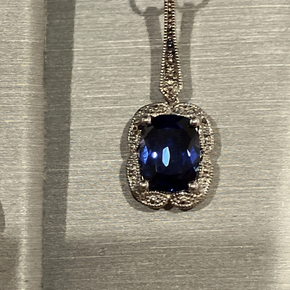 Juego de collar y pendientes de zafiro de plata de ley Zales Foto 2 de 4