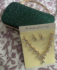 Women Green Clutch With a Beautiful Jwelery Set
