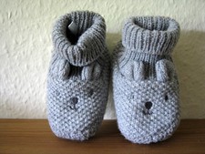 Sockenschuhe mit Gesicht u. Ohren, erste Lauf...