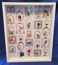Upcycled beaded floral shadow box
