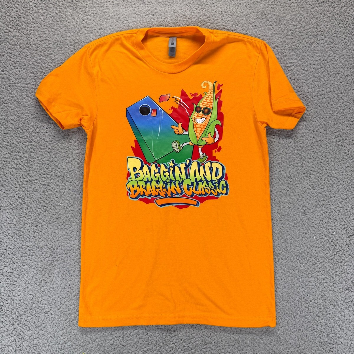Next Level Apparel Mens BAGGIN and BRAGGIN CLASSIC T Shirt Orange Size XS