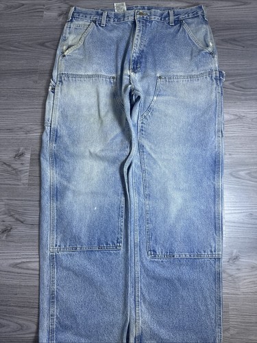 Carhartt faded denim blue jean double knee work wear thrashed pants size 38x32