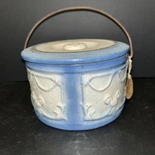 Antique blue and white stoneware crock with "draped windows" pattern w/ lid.