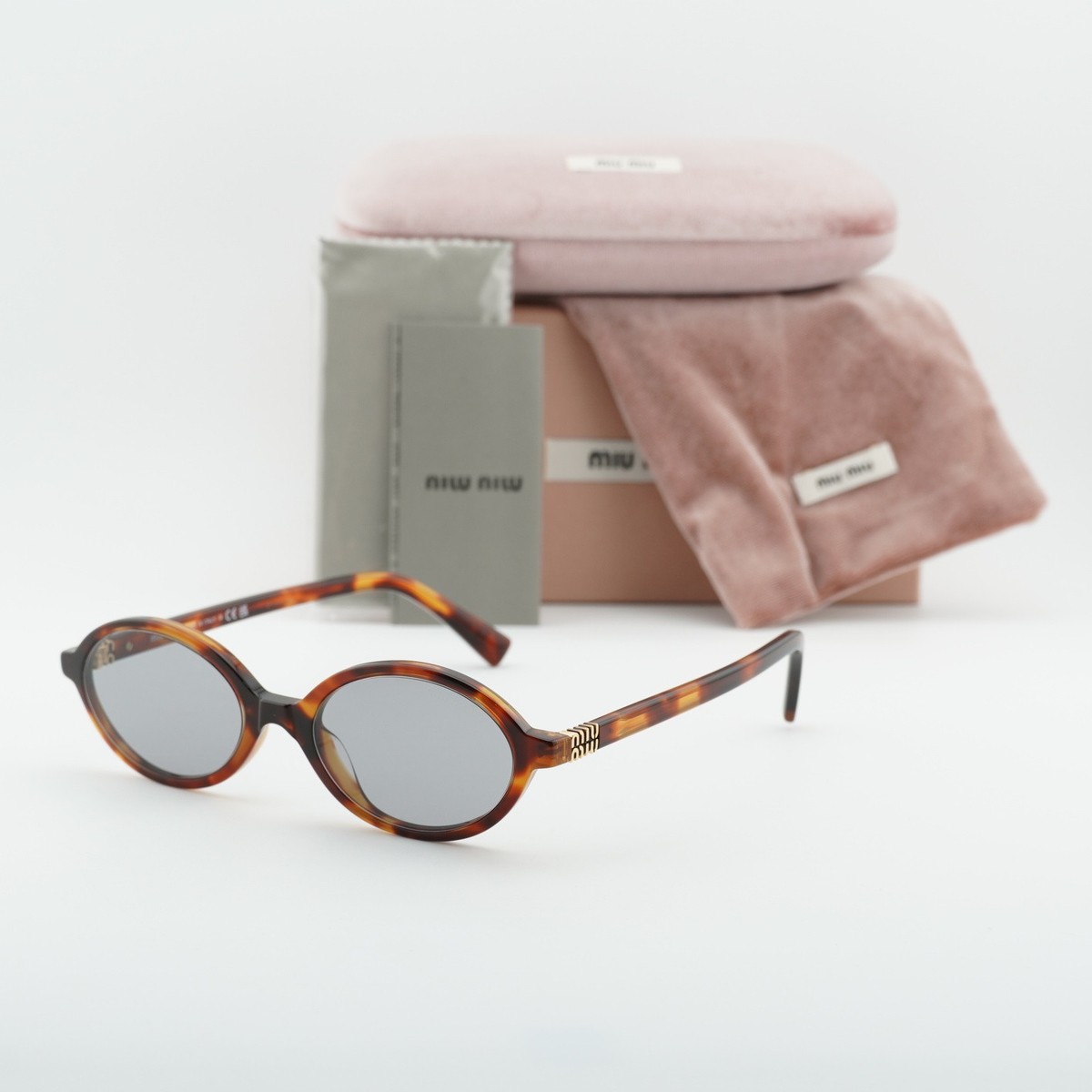 Miu Miu MU04ZS 21C40O Havana Mahogany/Grey 50-18-140 Sunglasses