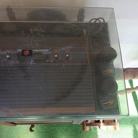 ATARI 2600 WOODGRAIN 6S CONSOLE W/CONTROLLERS,GAMES,ORGANIZER UNTESTED PARTS 