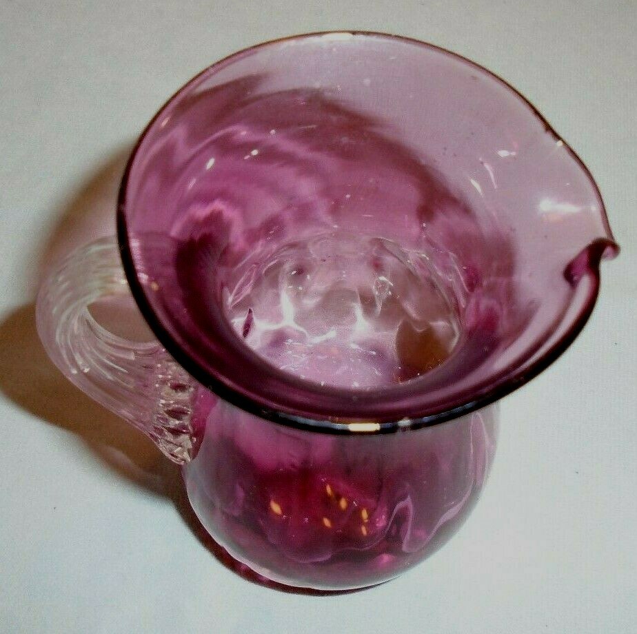 Pitcher Burgandy Hand Blown Glass, Clear Handle, 4" Tall 2.5" Across