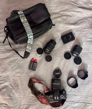 Nikon D3100 DSLR Camera w 3 lenses: AF 17-50mm, AF 55-200mm and AF 28-105mm
