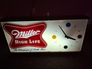 1957 MILLER HIGH LIFE CHAMPAGNE OF BEER LIGHT UP SHARK FIN CLOCK 20” X 18”