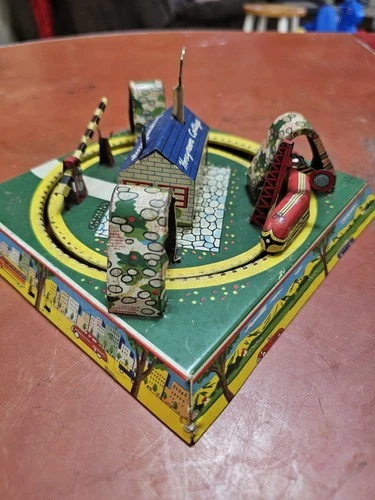 MARX, Made in Japan Honeymoon Cottage-Tin Litho Wind-up Toy, 1950's. works well!