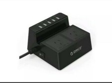 Orico Desktop Power Center Phone/Tablet Stand with Surge Prorector 5 Usb 2 ac