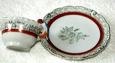 VTG. CHILD'S TOY CERAMIC TEA CUP SAUCER BIRD ON HANDLE SILVER OR GOLD TRIM