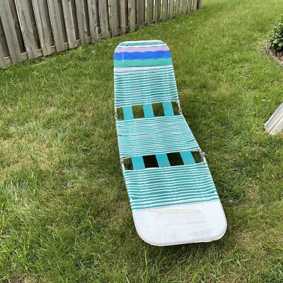 green plastic garden loungers