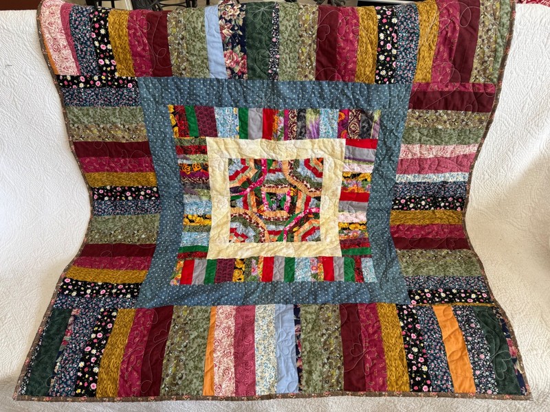 Machine Quilted  scrappy quilt 43x43 in