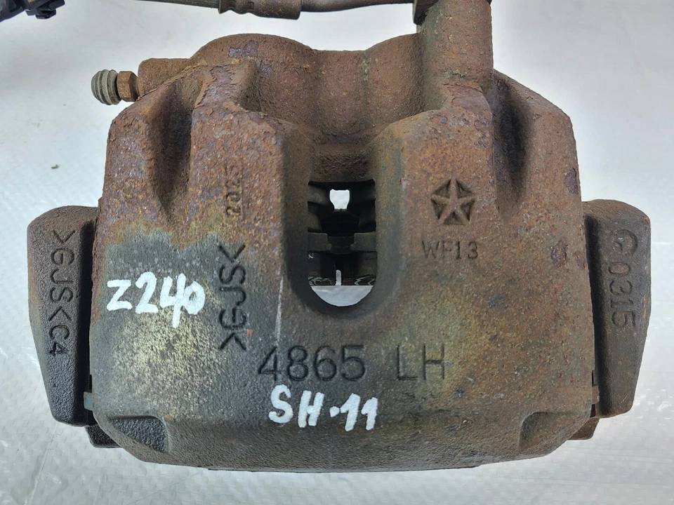 Pinza de freno delantera izquierda Jeep Grand Cherokee 2014-2015 OEM Foto 2 de 4