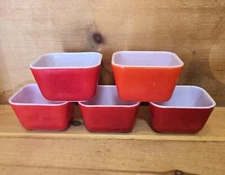1 Pyrex #501 Small Red Refrigerator Dish. 4-1/2"L x 3-3/8"W x 2-5/8"H.