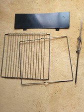 Grille four + grille porte broche + broche + lèche frite
