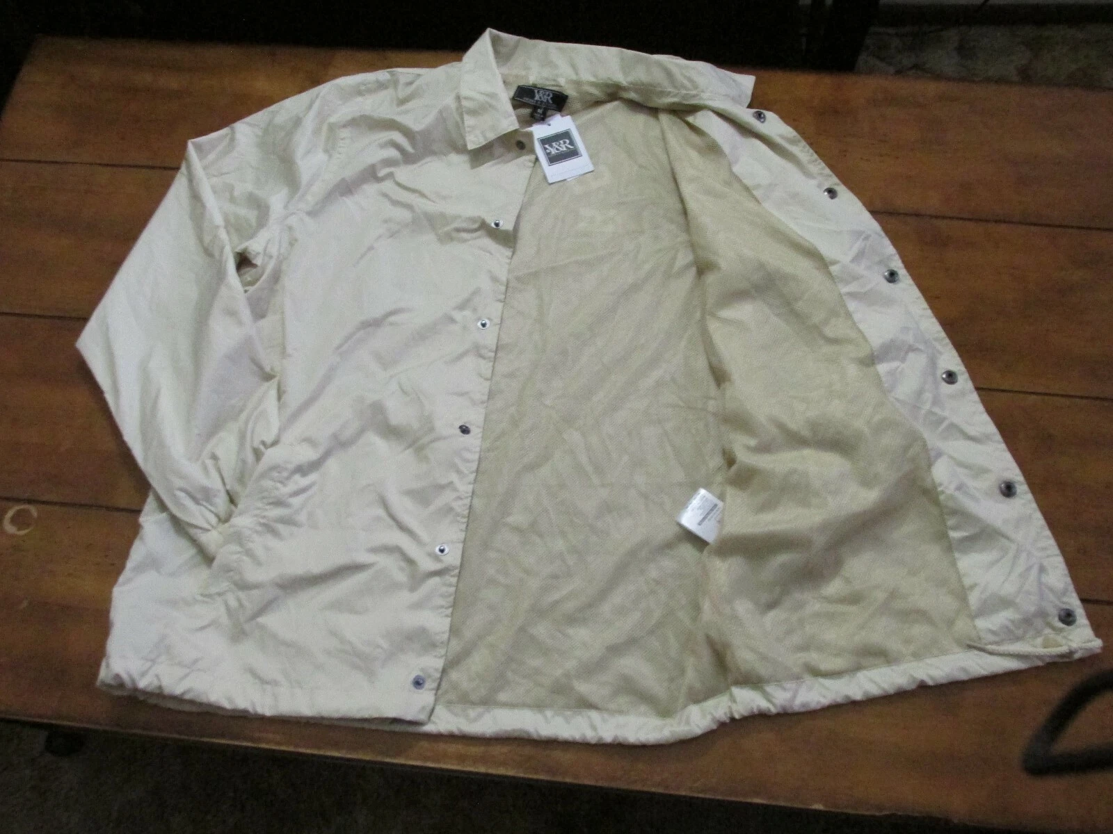 Men's young and reckless Windbreaker jacket Color Sand Size Medium.