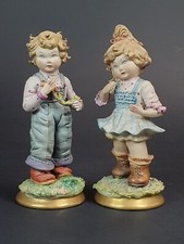 COPPIA SCULTURE IN PORCELLANA CAPODIMONTE VOLTA ANNI '80
