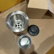 Kitchen sink drain assembly with strainer