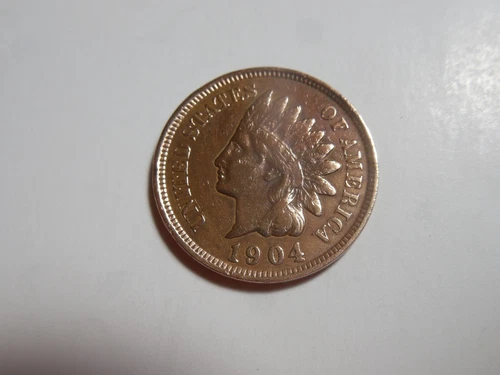 1904 Indian Head Penny in solid VF+ condition . But you decide!!!!!
