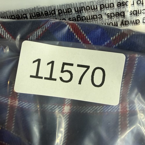 Scotsman men’s XL blue plaid flannel shirt, white label with number 11570, in clear plastic packaging.