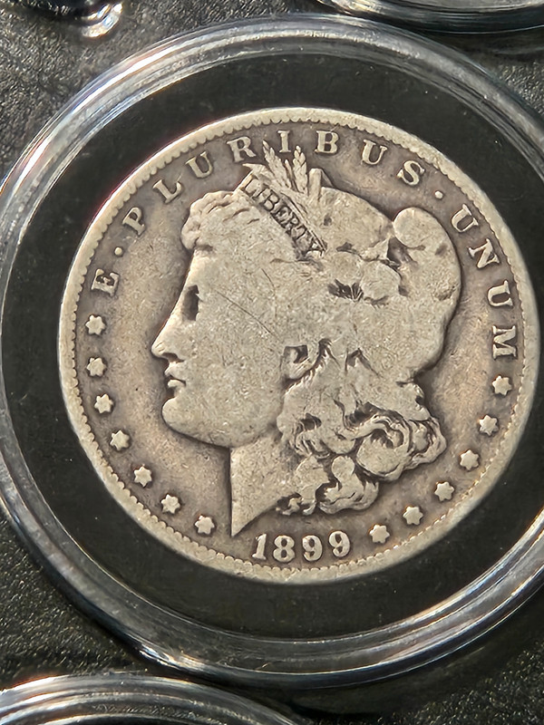 1899-O MORGAN SILVER DOLLAR