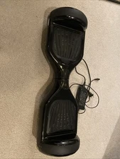 Used Hoverboard. Used But Still Works 100% Fine. Comes With Charger.